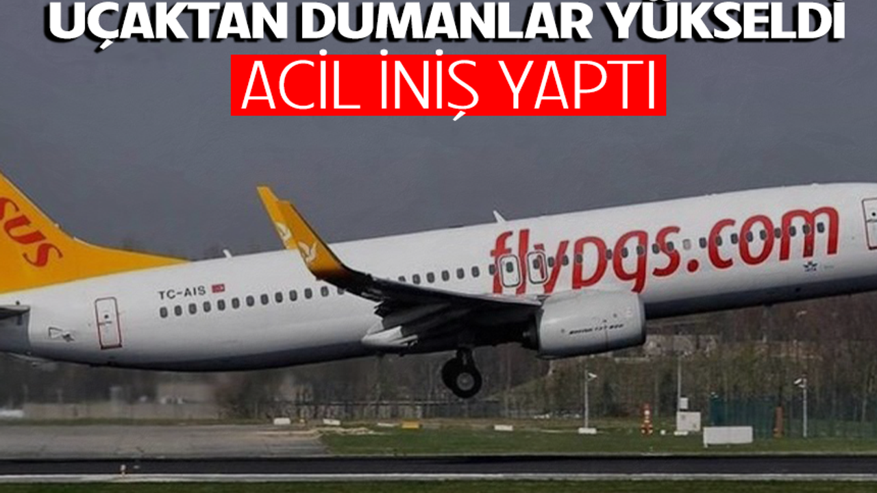 Acil iniş yapan uçaktan dumanlar yükseldi