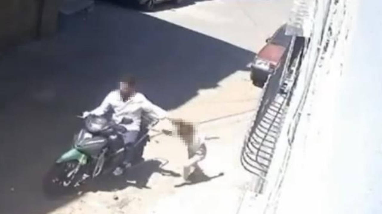 Kızını darp edip motosikletle sürükleyen babanın 12 suç kayd