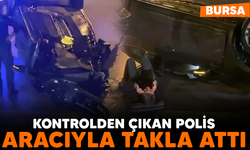Bursa'da kontrolden çıkan polis, aracıyla takla attı