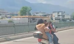 Bursa’da motosiklete 5 kişi binen aile yürekleri ağza getirdi