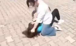 Bursa'da  ortaokul öğrencisi kız, okul arkadaşını darp edip yerde sürükledi