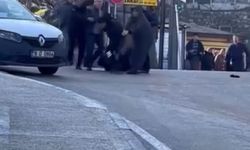 Bursa Osmangazi'de taksici ile motosiklet sürücüsü tekme tokat kavga etti