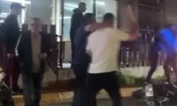 Sokak ortasında tekmeli sopalı kavga kamerada