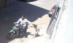 Kızını darp edip motosikletle sürükleyen babanın 12 suç kaydı olduğu ortaya çıktı