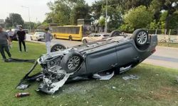Bursa Osmangazi'de takla atan araçtan burunları kanamadan çıktılar