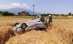 Bursa İnegöl'de taklalar atarak tarlaya uçtu