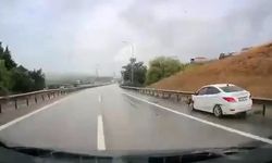 Bursa'da yağışlı havaya aldırmadı, bariyerlere böyle girdi