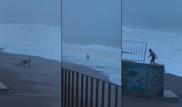 Antalya'da dev dalgalar arasında ilginç sabah sporu!