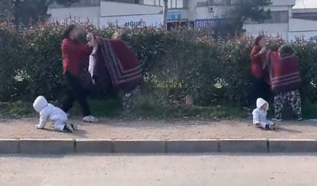 Bursa'da bebeğin önünde dilenci kavgası!