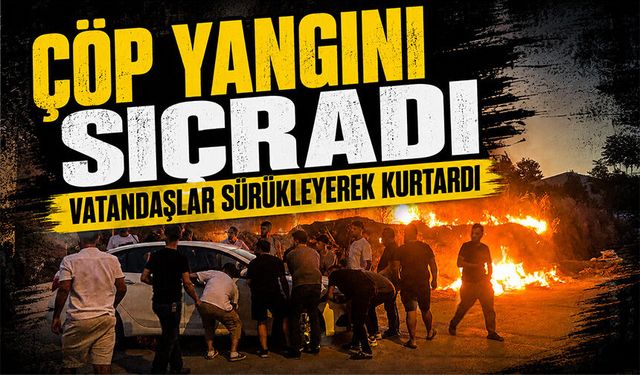 Bursa Osmangazi'de çöp yangını çalılığa sıçradı, otomobili vatandaşlar sürükleyerek kurtardı