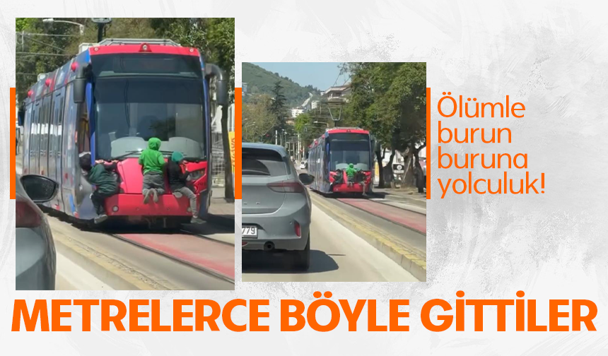 Bursa Osmangazi'de tramvayın arkasına tutunan çocuklar yürekleri ağza getirdi