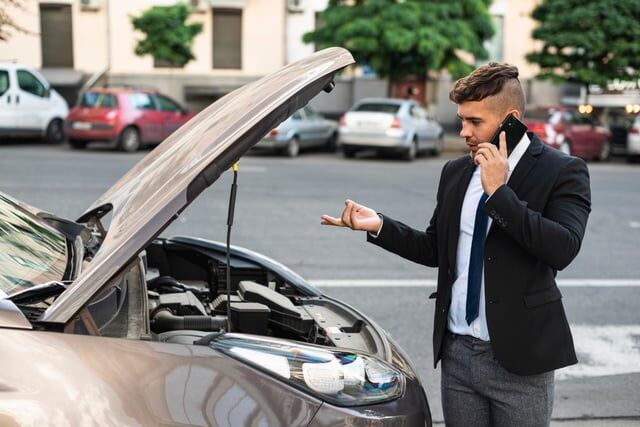 Side View Business Man Talking With Car Service 733D6Ec3A0